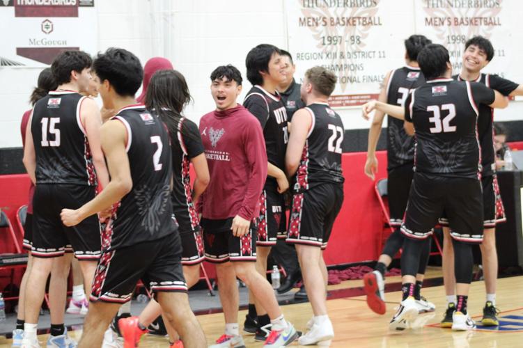 The United Tribes men's basketball team celebrates after completing their Region XIII championship game victory over Dakota College at Bottineau on Sunday.  

JOSH DUNGAN
